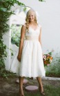 http://boards.weddingbee.com/topic/dolly-couture-2-dresses/#axzz2v6jxxlU6